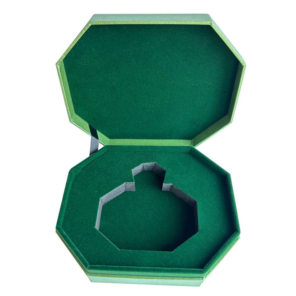 Open geschenkdoos voor parfum met groene, met vlies beklede fleshouder